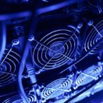 Close-up of computer cooling fans with blue LED lighting