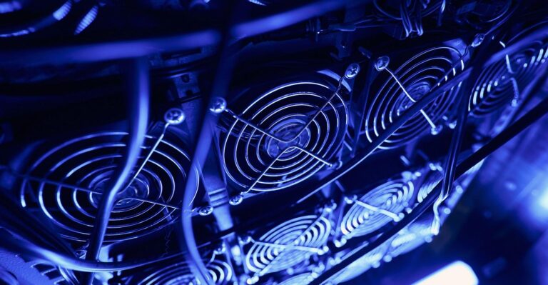 Close-up of computer cooling fans with blue LED lighting